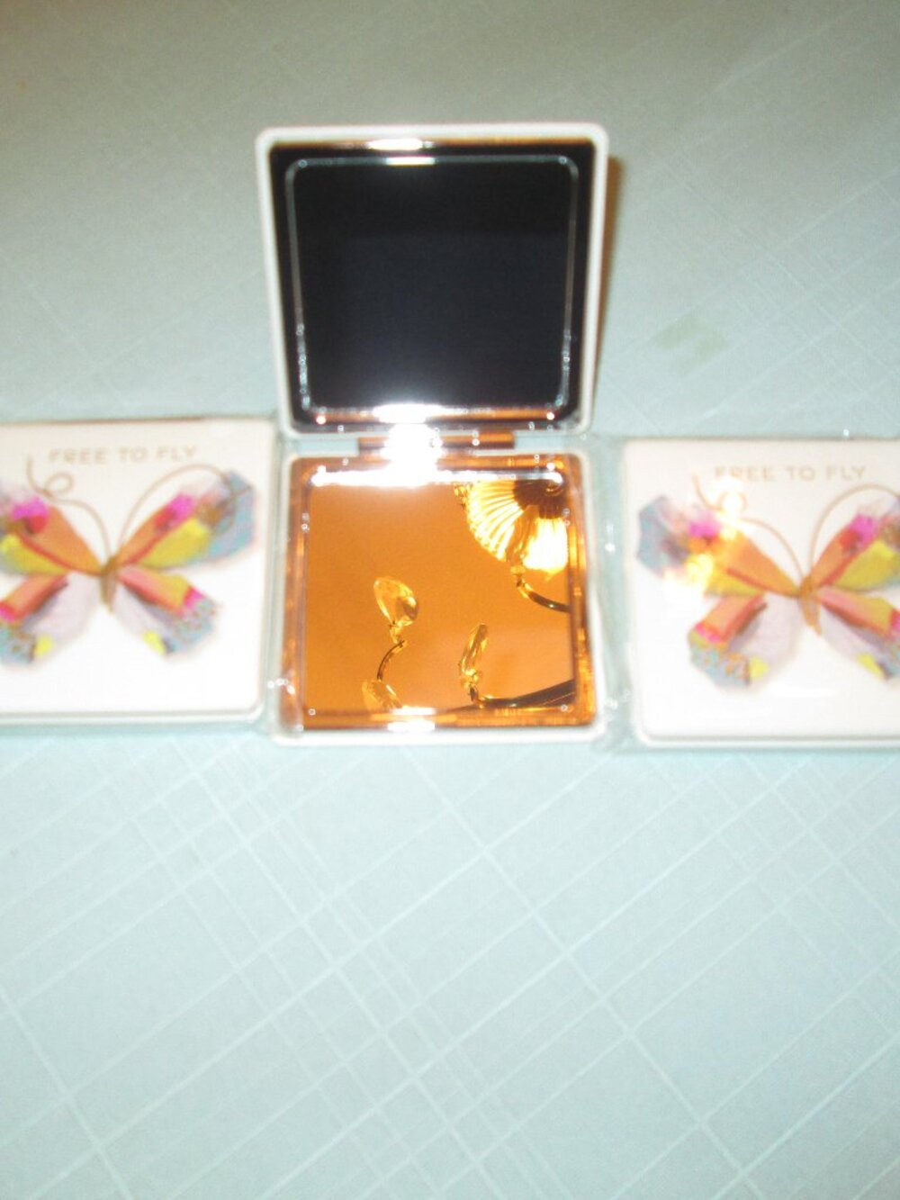 Three Pocket Mirrors